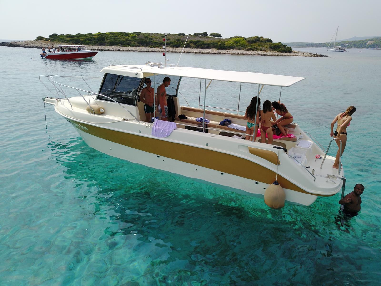 Swimming stop at the Blue Lagoon on a private boat tour