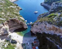 Stiniva bay  - breathtaking Stiniva Cove, picturesque cliffs which vertically descend into the azure blue sea creating a unique scene. Voted the best beach in Europe in 2016.